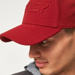 Oakley 6 PANEL STRETCH CAP EMBOSSED HAT IRON RED -Eagle Swing Outlet kb4921f25e7fc6a0b12bae1eaccb7cf4b